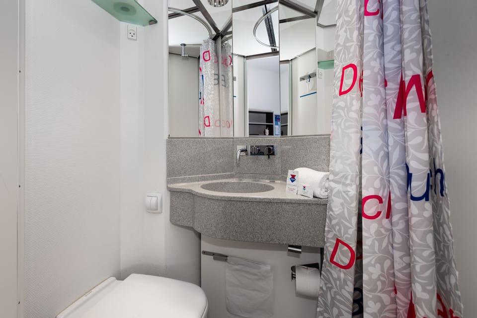 Shower, free toiletries, towels, soap
