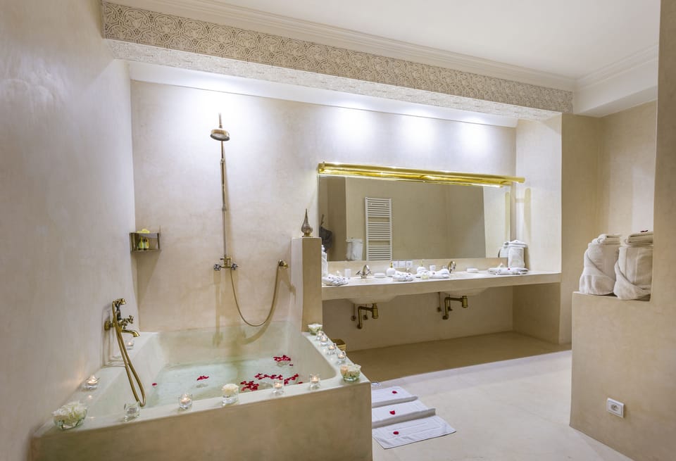 Royal Suite, 2 Bedrooms | Bathroom | Shower, rainfall showerhead, free toiletries, hair dryer