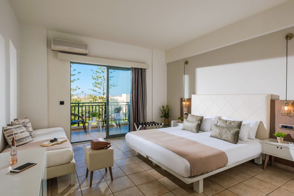 Triple Room | In-room safe, desk, iron/ironing board, bed sheets