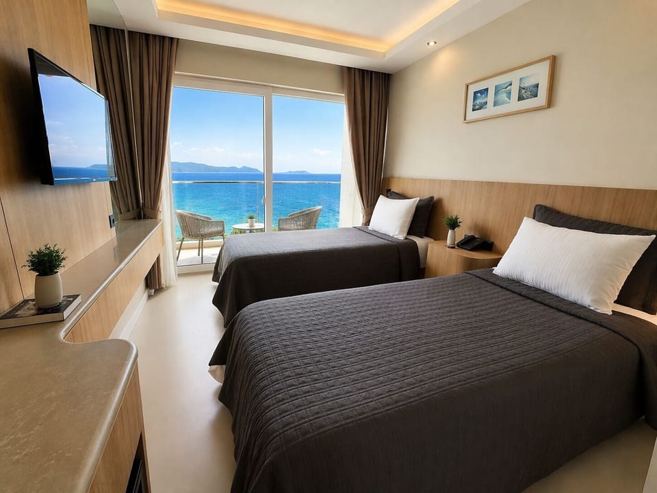 Standard Twin Room, 2 Twin Beds, Sea View | Minibar, free WiFi