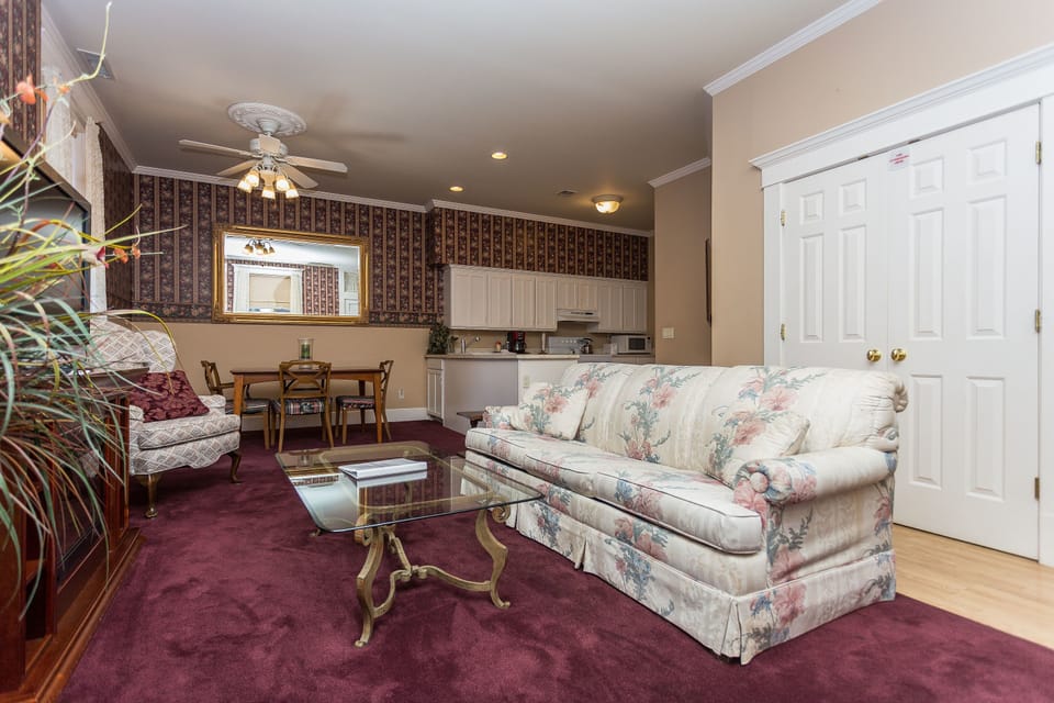 Classic Penthouse, 1 Bedroom | Living area | Flat-screen TV, fireplace, DVD player