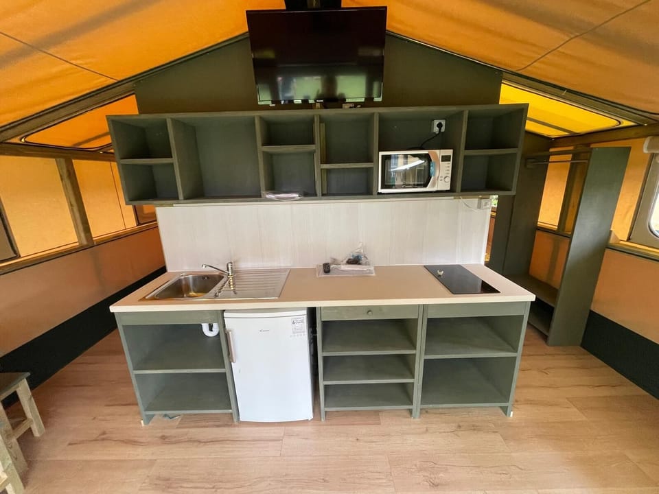 Deluxe Tent | Private kitchen | Fridge, coffee/tea maker, electric kettle, highchair