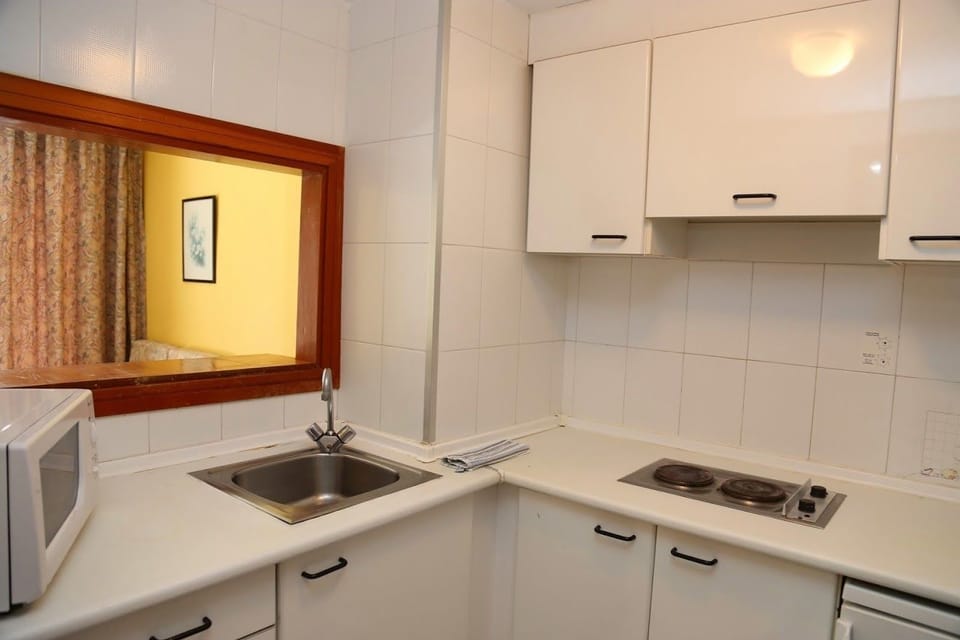 Full-size fridge, microwave, stovetop, electric kettle