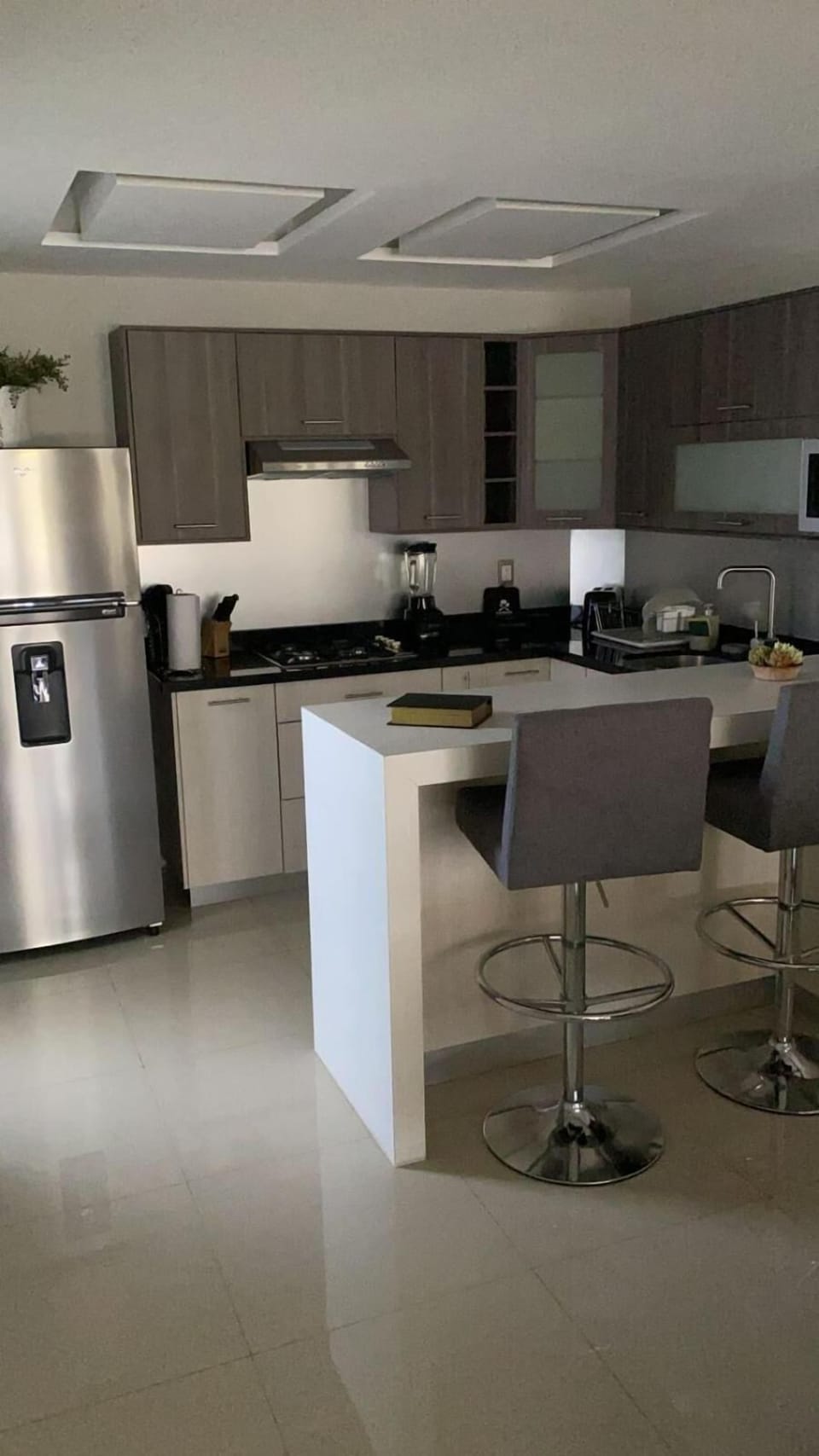 Full-size fridge, microwave, stovetop, coffee/tea maker