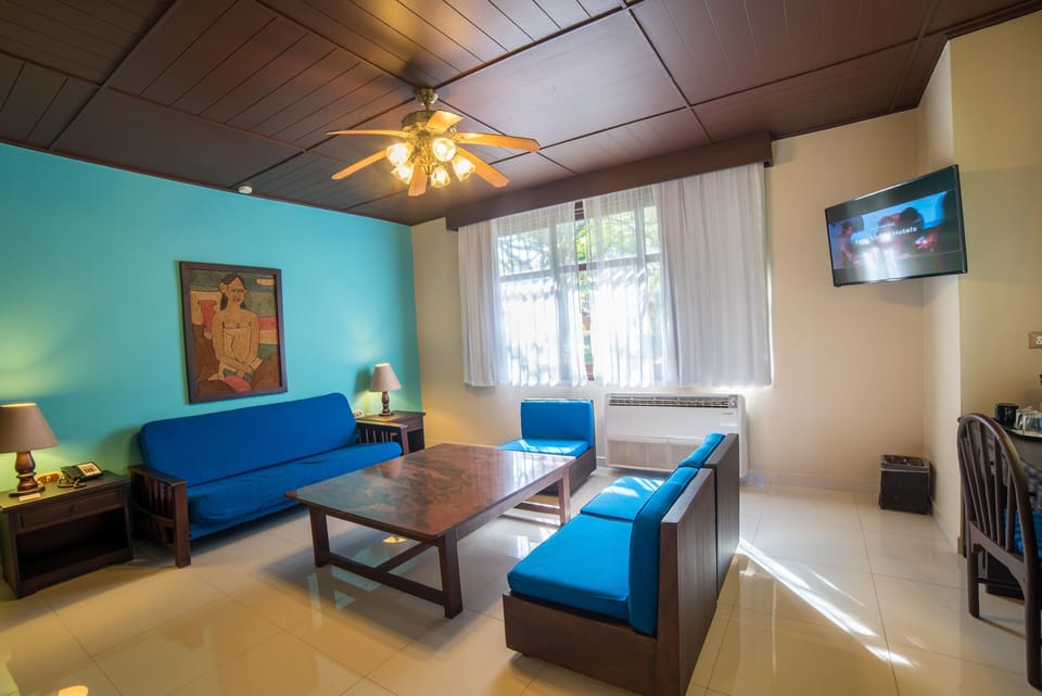 Suite, Oceanfront (Bungalow) | Minibar (free items), in-room safe, desk, blackout drapes