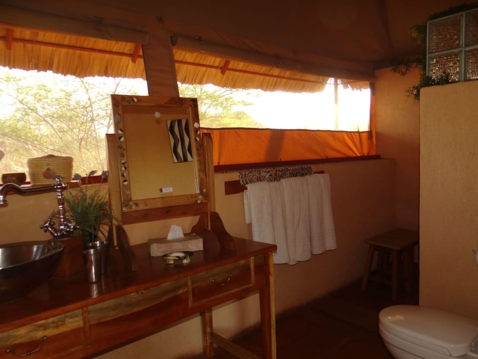 Luxury Tent, 2 Twin Beds, Private Bathroom, Garden View | Bathroom | Shower, bathrobes, slippers, towels
