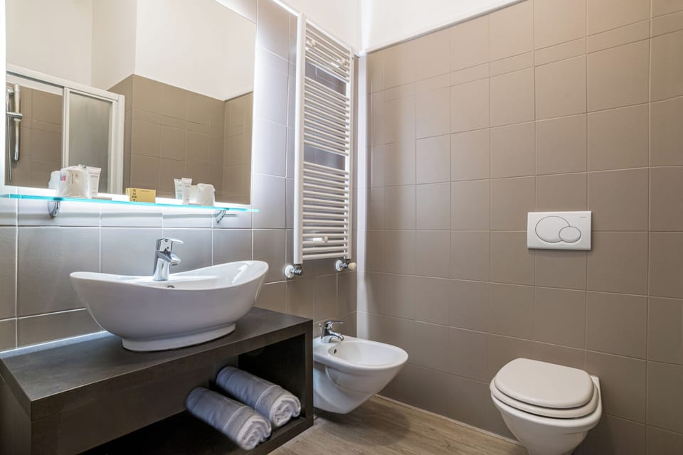 Deep soaking tub, free toiletries, hair dryer, bidet