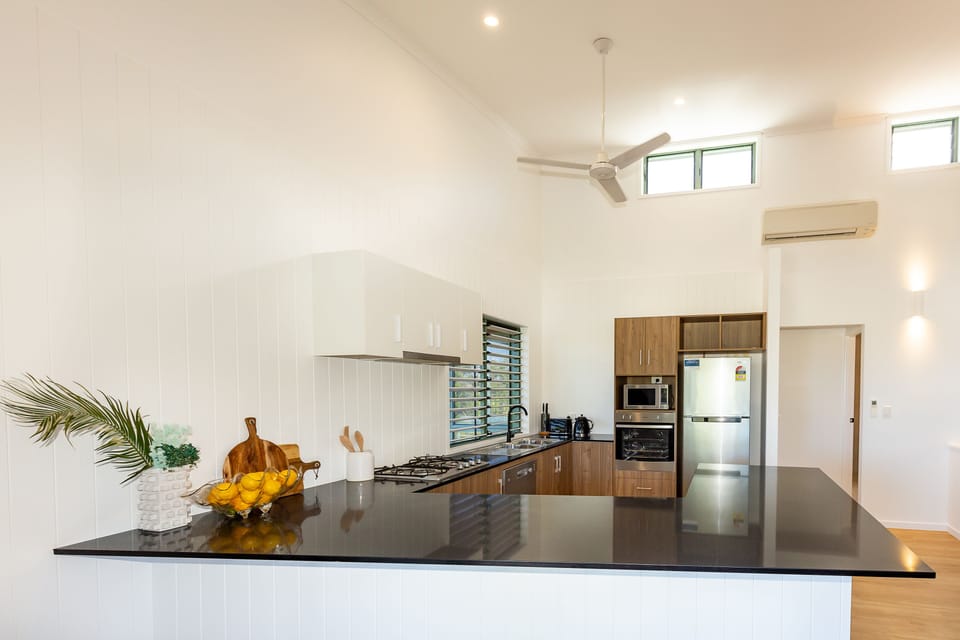2 Bedroom Villa 7 | Private kitchen | Full-size fridge, microwave, oven, stovetop