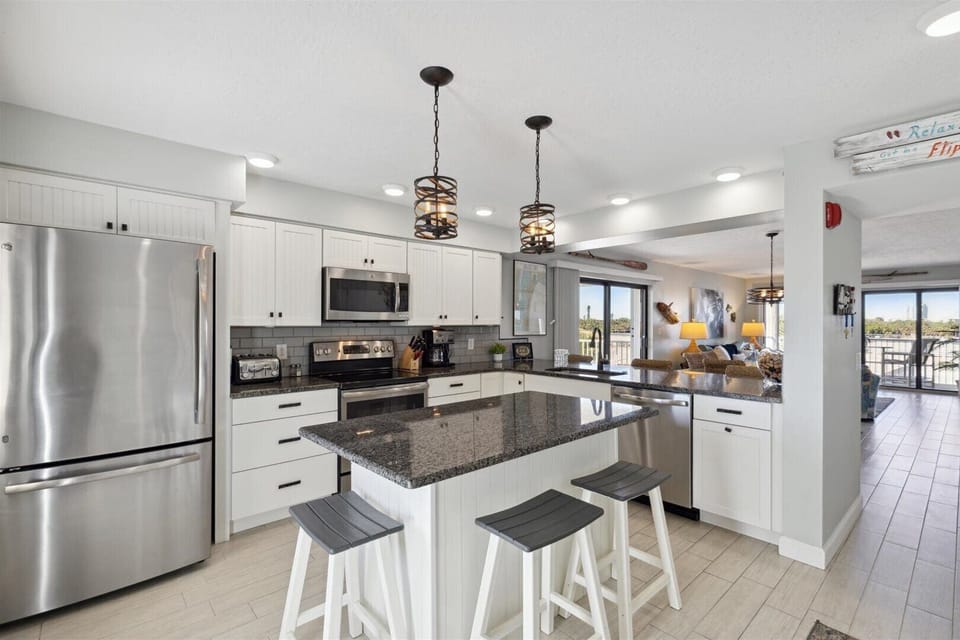 Partial Ocean View Two-Bedroom Condo - Unit 300 | Private kitchen | Fridge, microwave, oven, coffee/tea maker