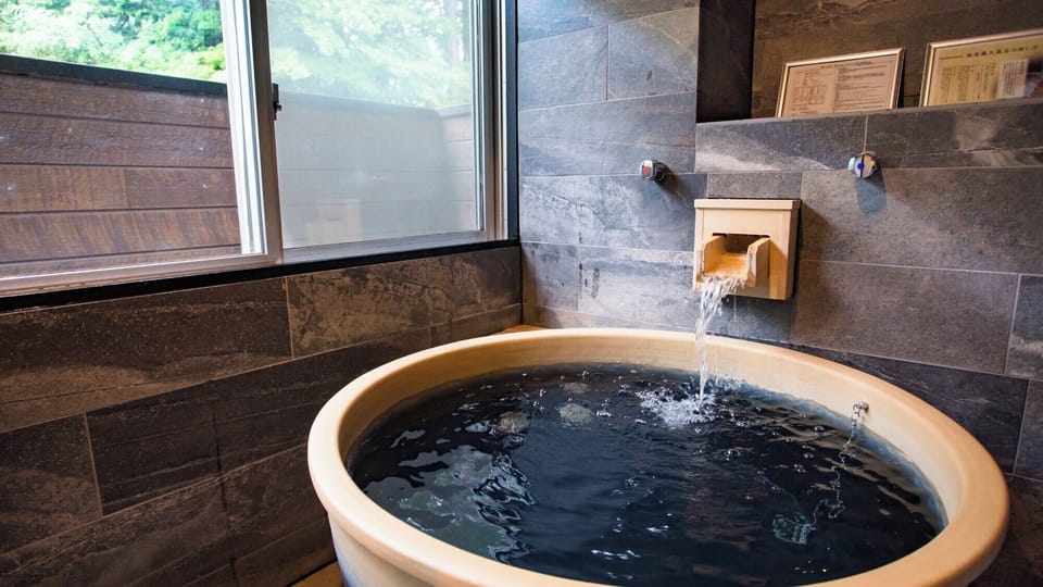 Modern Western Suite Japanese Western Room with Open-air Bath, Non Smoking | Bathroom | Separate tub and shower, spring water tub, free toiletries, hair dryer