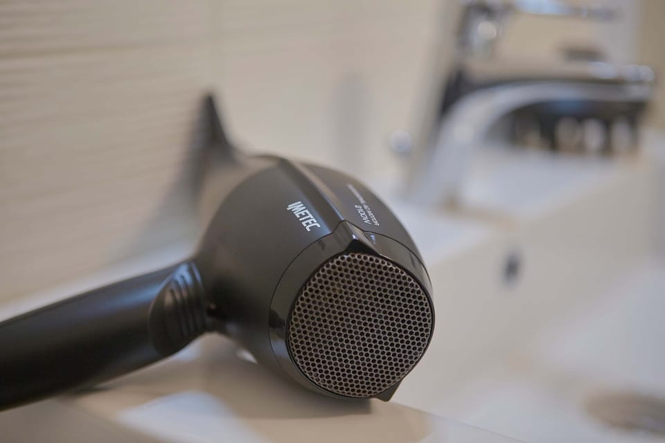 Classic Triple Room, Lake View | Bathroom | Shower, hair dryer, towels