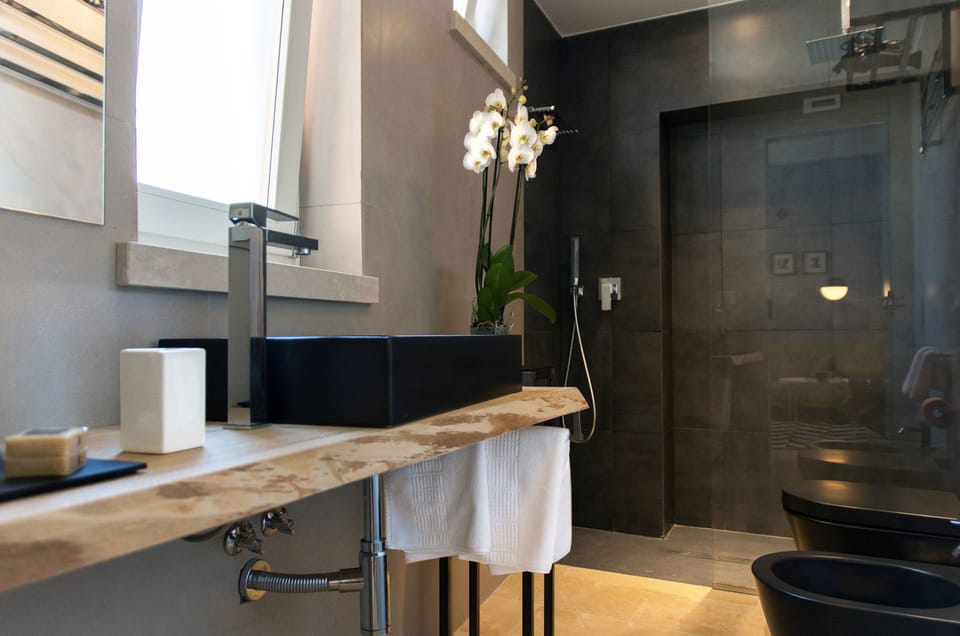 Junior Suite (4) | Bathroom | Shower, designer toiletries, hair dryer, slippers