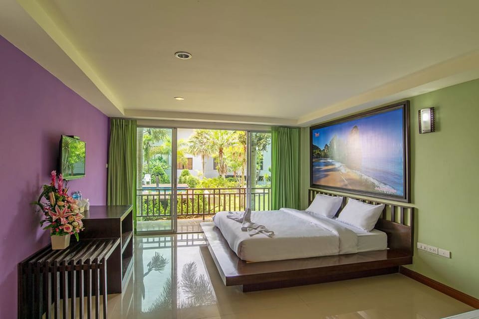 Deluxe Room with Pool View  | In-room safe, free WiFi, wheelchair access