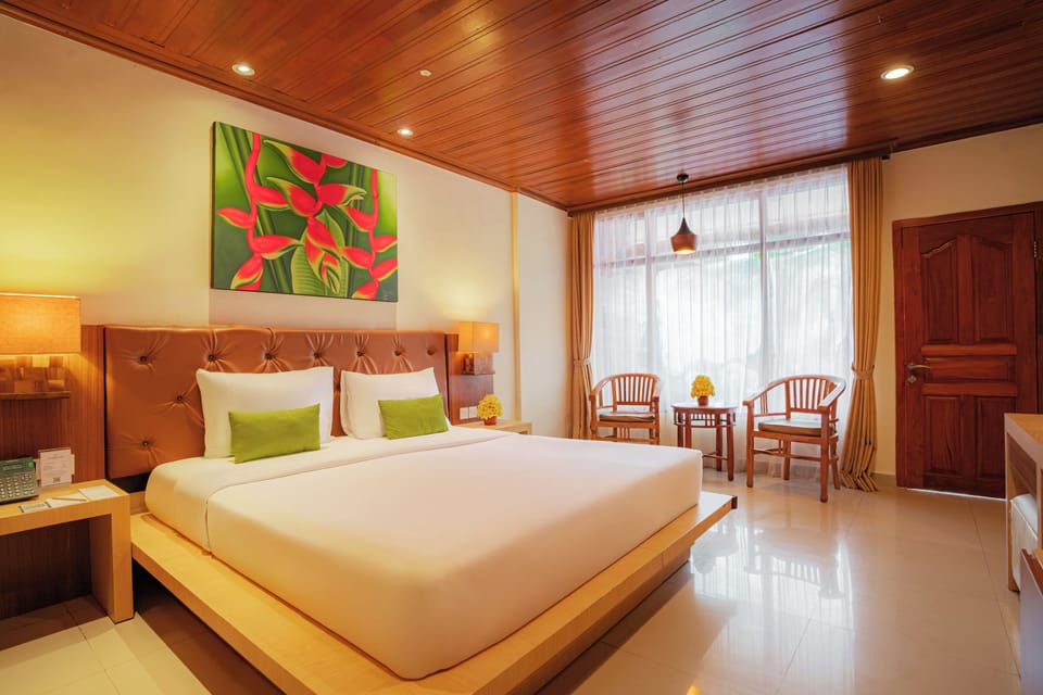Deluxe Room, Pool View | Premium bedding, minibar, in-room safe, individually decorated