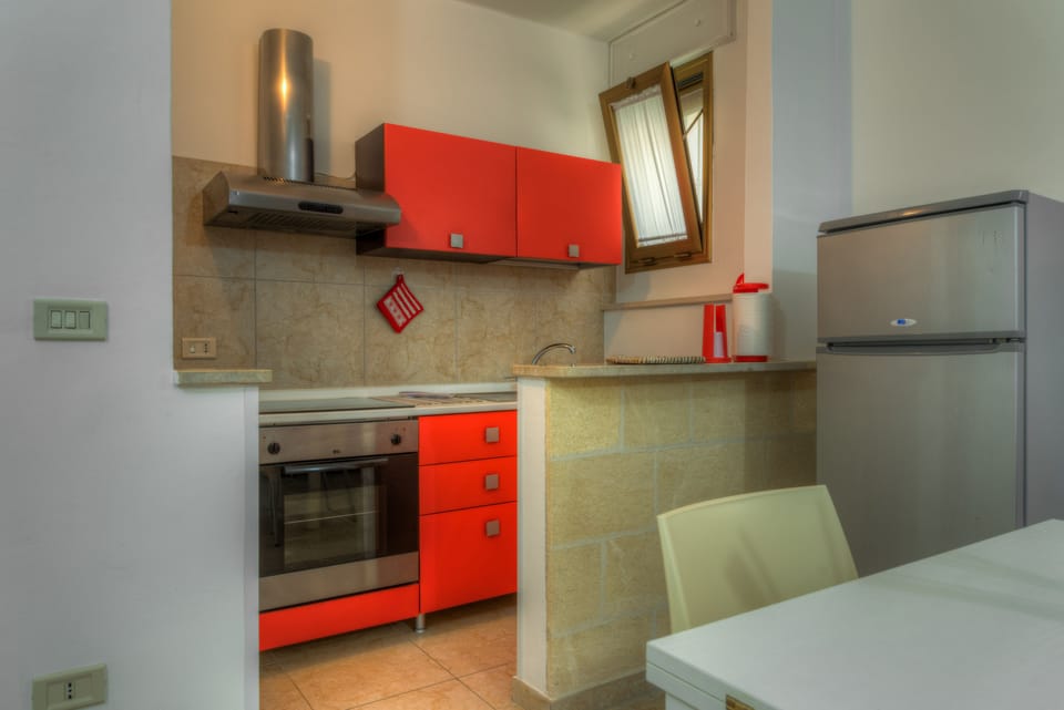 Apartment, 1 Bedroom | Private kitchenette | Highchair