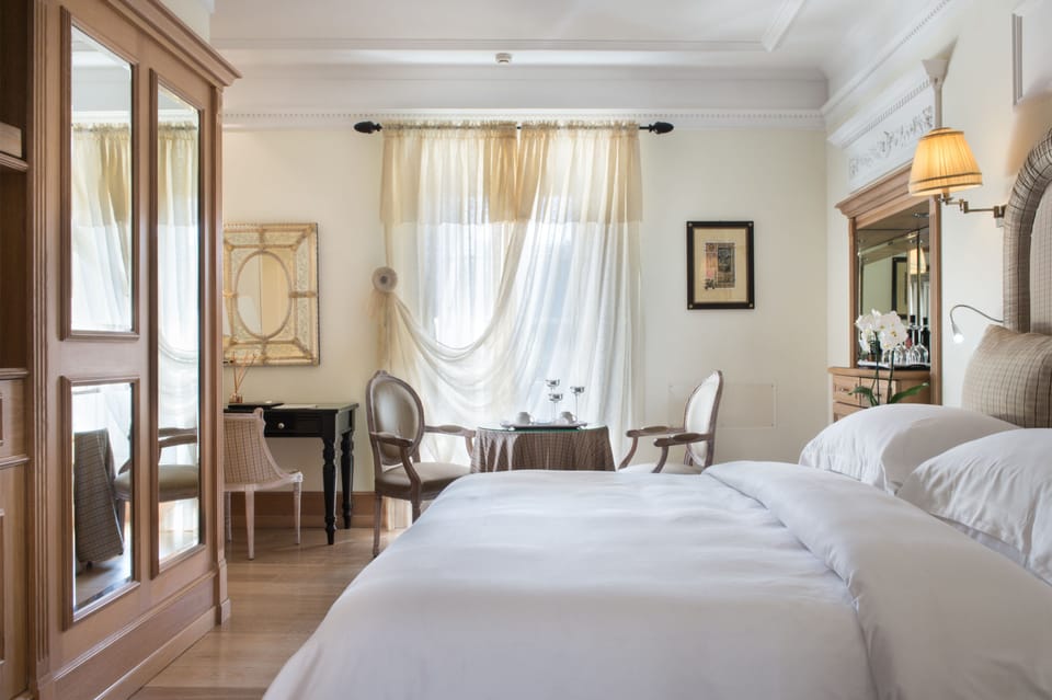 Deluxe Double Room, City View | Premium bedding, minibar, in-room safe, individually decorated
