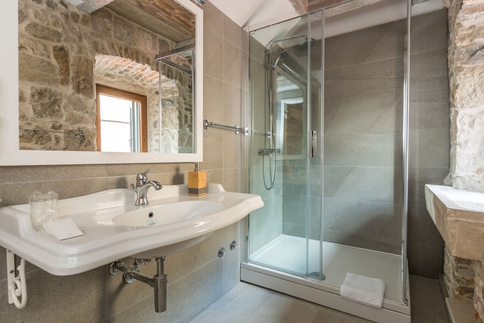 Shower, free toiletries, hair dryer, towels