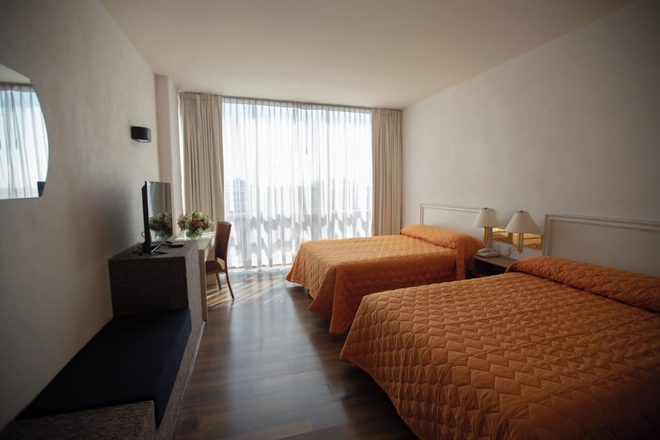 Standard Room, 2 Double Beds | Desk, iron/ironing board, free WiFi, bed sheets