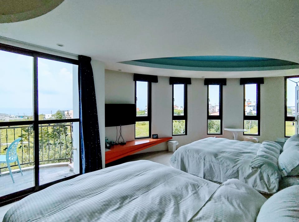 Superior Quadruple Room, Ocean View | Individually decorated, individually furnished, desk, laptop workspace