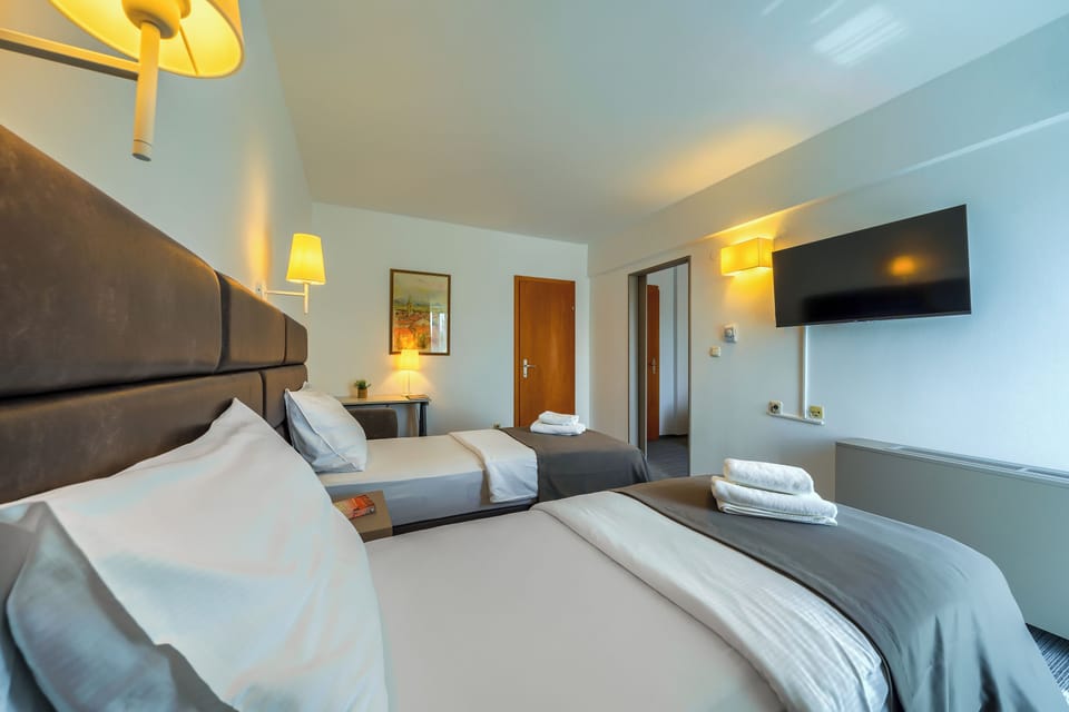 Family Room, 2 Bedrooms, Balcony, Park View | Desk, laptop workspace, free WiFi, bed sheets