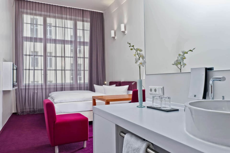 Junior Suite | Hypo-allergenic bedding, in-room safe, desk, blackout drapes