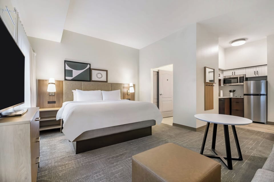 Studio Suite, 1 King Bed, Kitchen | In-room safe, desk, blackout drapes, iron/ironing board