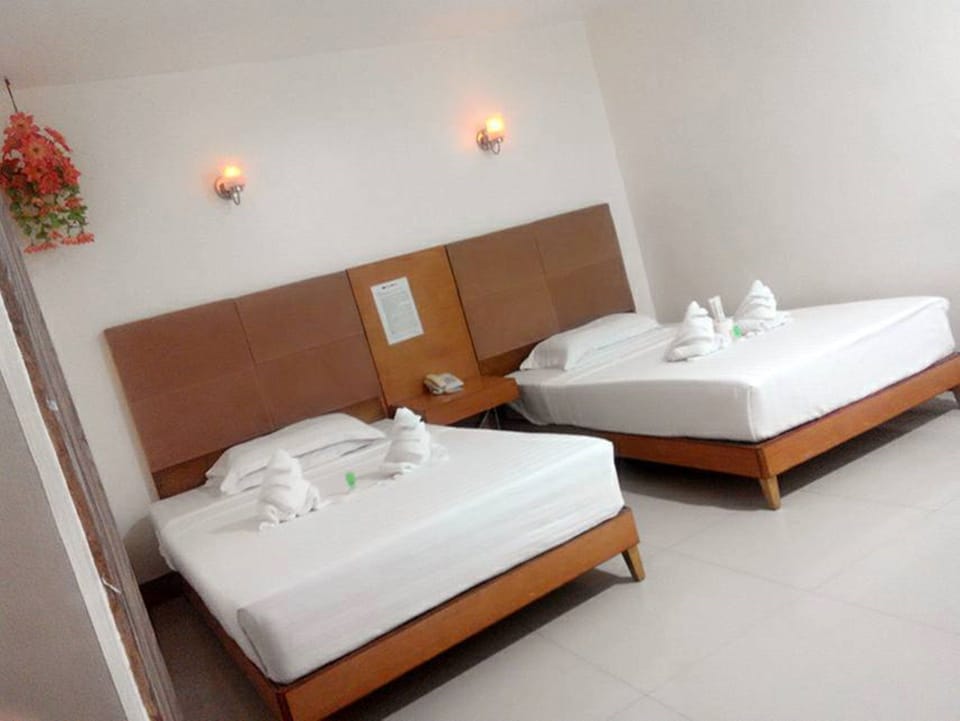 Family Room | Desk, bed sheets