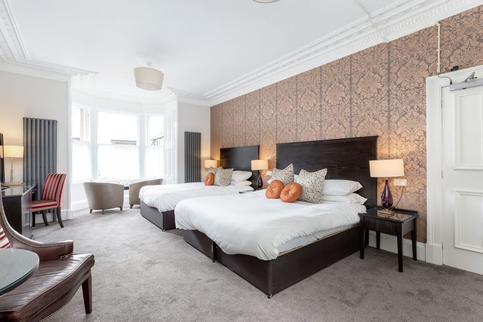 Superior Quadruple Room, Ensuite, Garden View | Individually decorated, desk, laptop workspace, blackout drapes