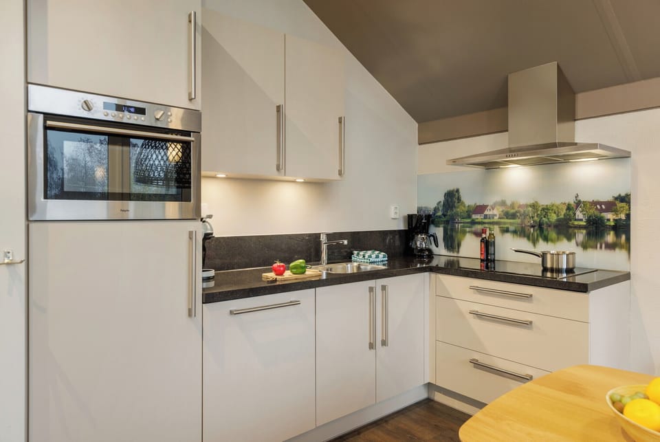 Deluxe Cottage, 1 Bedroom | Private kitchen | Fridge, microwave, stovetop, dishwasher