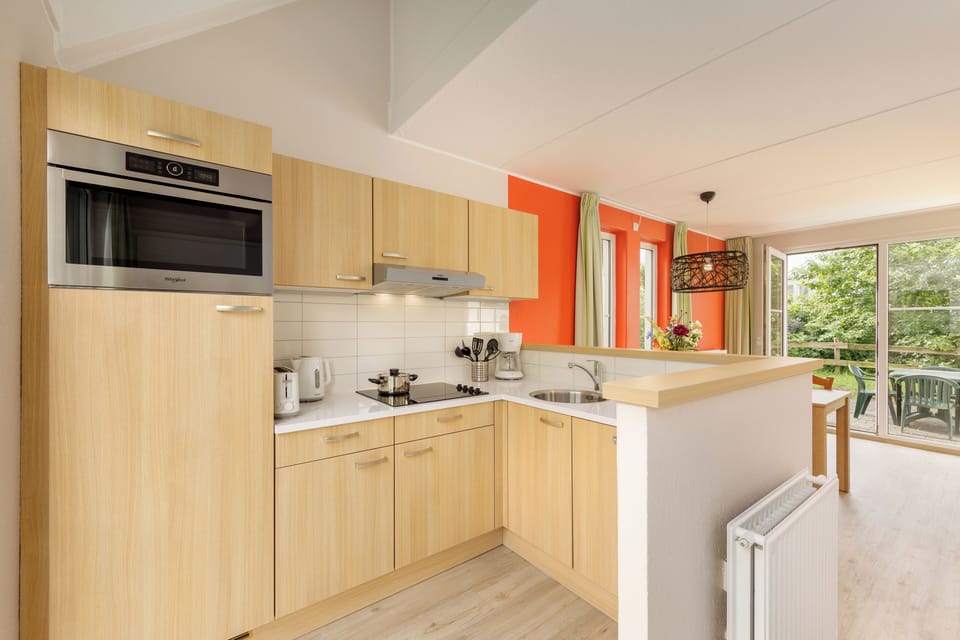 Comfort Cottage, 2 Bedrooms | Private kitchen | Fridge, microwave, stovetop, coffee/tea maker