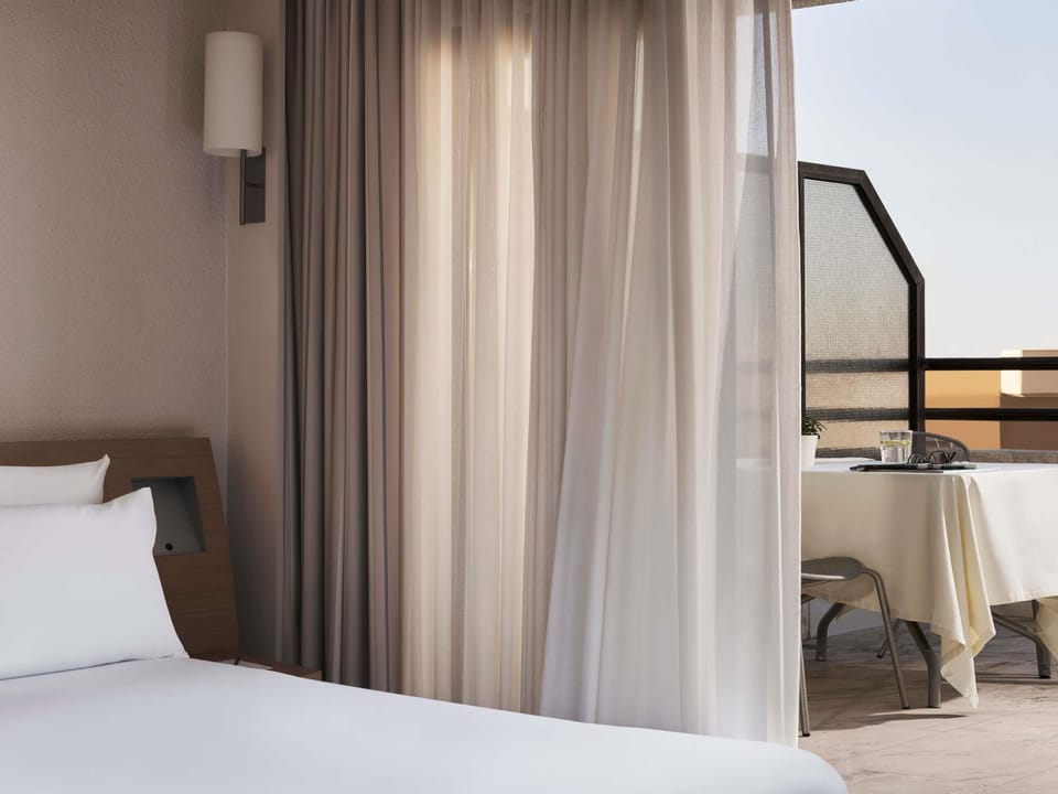 Executive Room With Balcony, 1 double bed or 1 double bed with sofa bed | Minibar, in-room safe, desk, blackout drapes