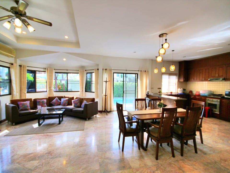 Family Villa | Living area | 42-inch flat-screen TV with cable channels, TV, DVD player