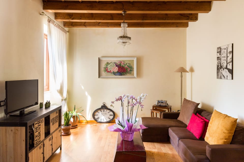 Apartment, Courtyard View | Living area | 32-inch flat-screen TV with digital channels, TV