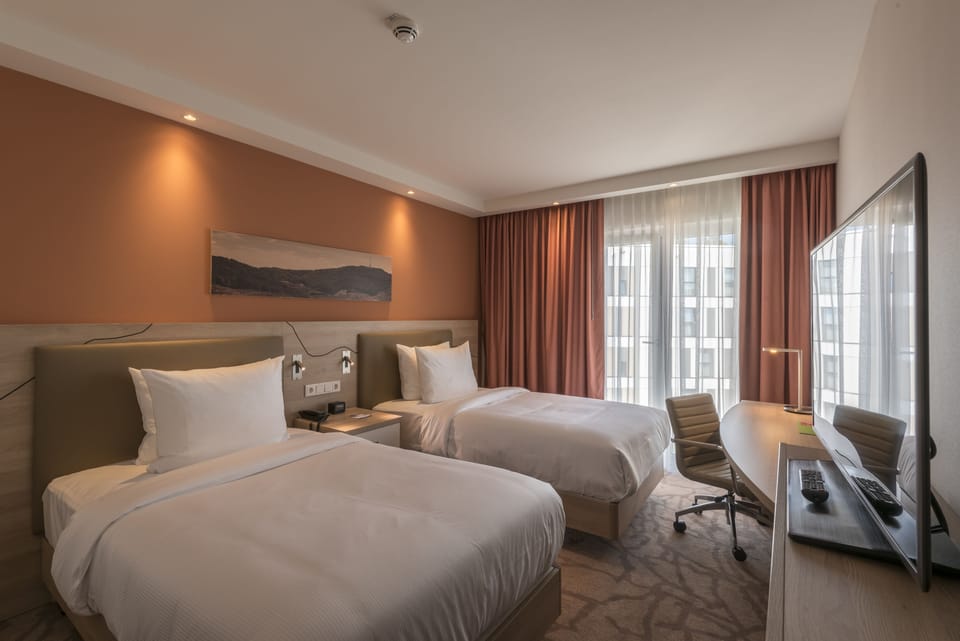 Twin Room, Non Smoking | In-room safe, desk, iron/ironing board, free WiFi
