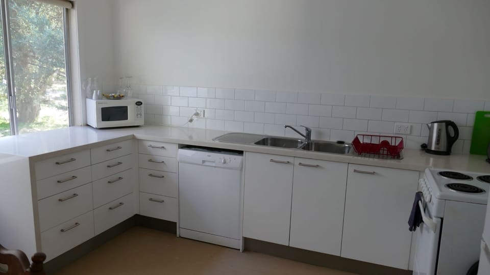 Family Cottage, 3 Bedrooms | Private kitchen | Fridge, microwave, coffee/tea maker, electric kettle