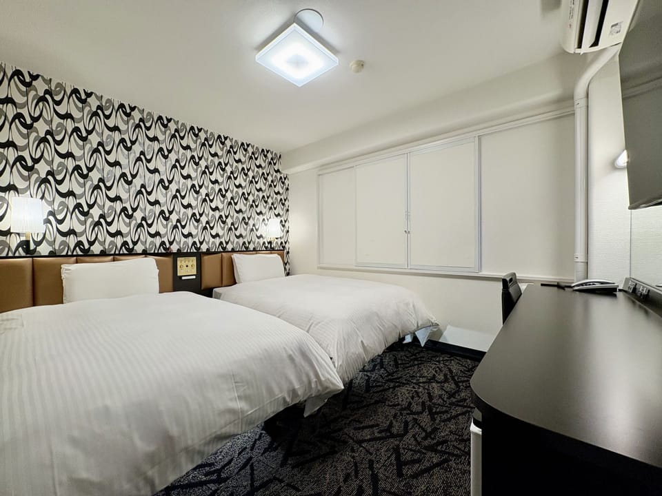 Twin Room, Non Smoking | Down comforters, desk, laptop workspace, free WiFi