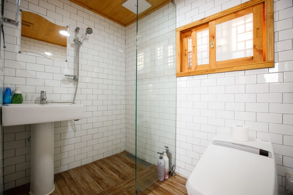 Shower, free toiletries, hair dryer, slippers