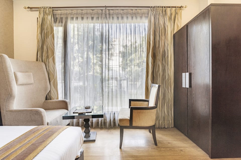Deluxe Room, 1 Double Bed, City View | Balcony view