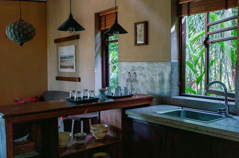 Mangala Coco River Family Villa | Minibar, in-room safe, laptop workspace, blackout drapes