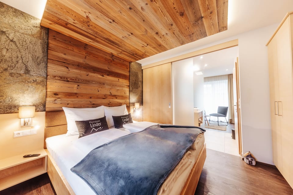Deluxe Suite, 2 Bedrooms, Courtyard View, Courtyard Area | Down comforters, in-room safe, individually decorated, desk