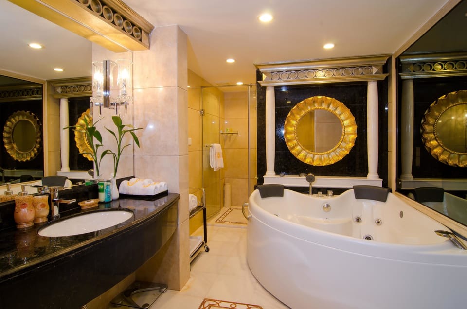 Superior Executive Suite  | Bathroom | Hair dryer, slippers