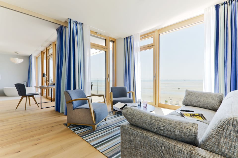 Suite, Sea View | Living area | Flat-screen TV