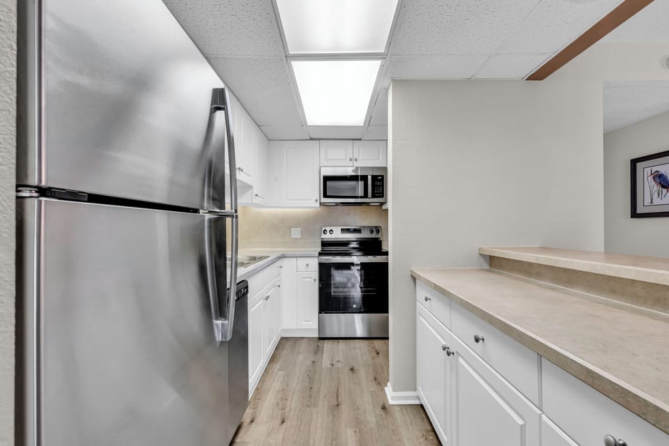 Townhome, 2 Bedrooms | Private kitchen | Fridge, microwave, oven, stovetop