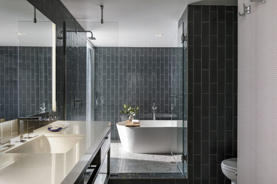 Designer toiletries, hair dryer, bathrobes, towels