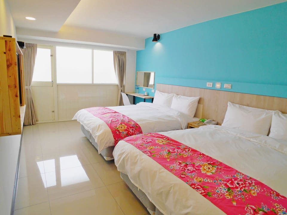 Standard Quadruple Room, City View | Desk, blackout drapes, iron/ironing board, free WiFi