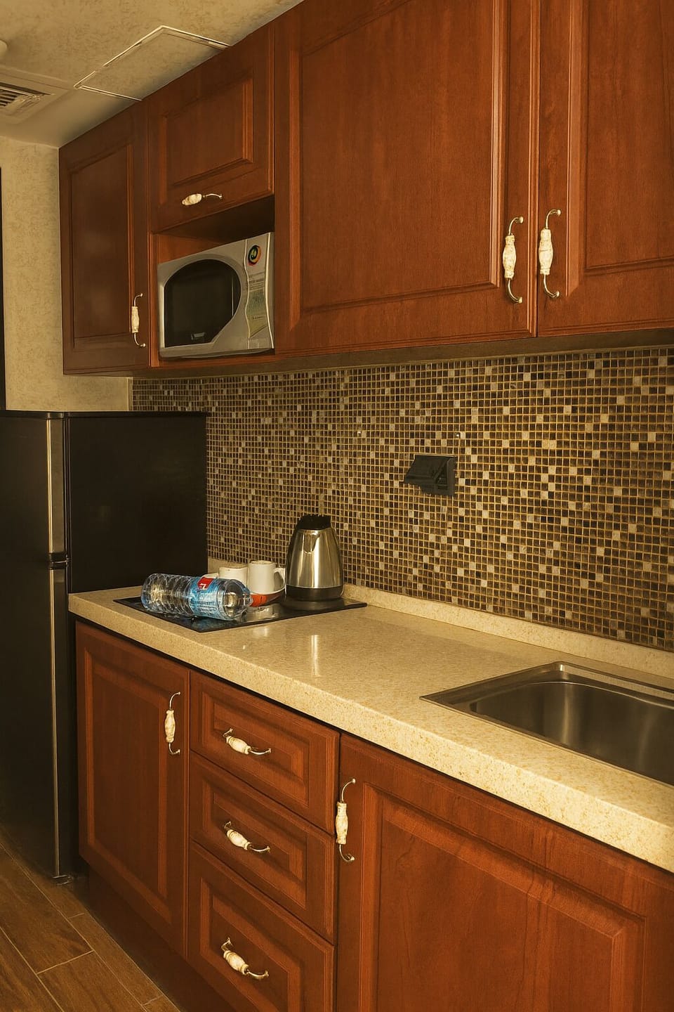 Coffee/tea maker, fridge, microwave, electric kettle