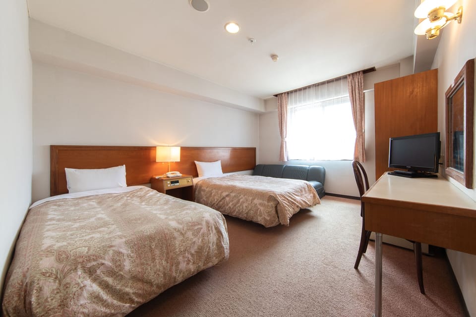 Basic Twin Room, Annex Building | Down comforters, individually furnished