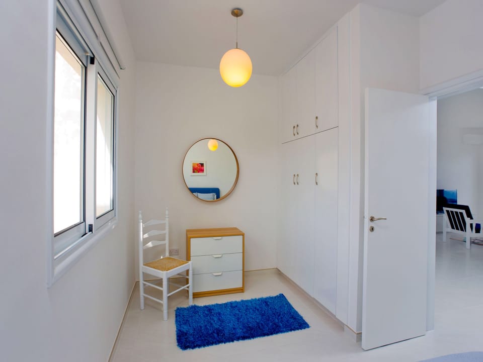Deluxe Apartment, 2 Bedrooms, Beachfront | Living area | Flat-screen TV