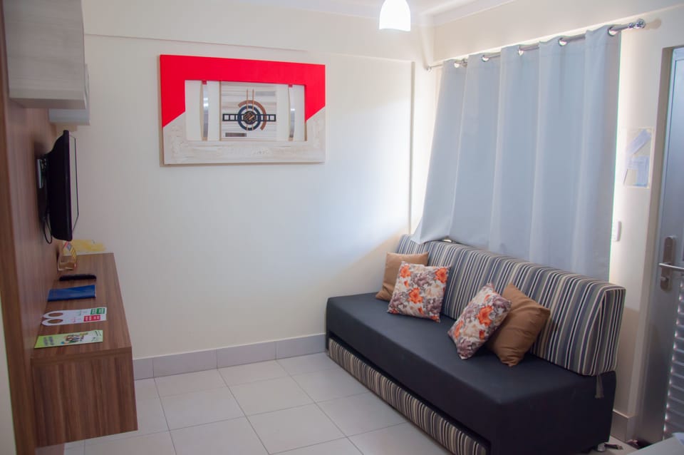Apartment | Living area | 32-inch flat-screen TV with cable channels, TV, foosball