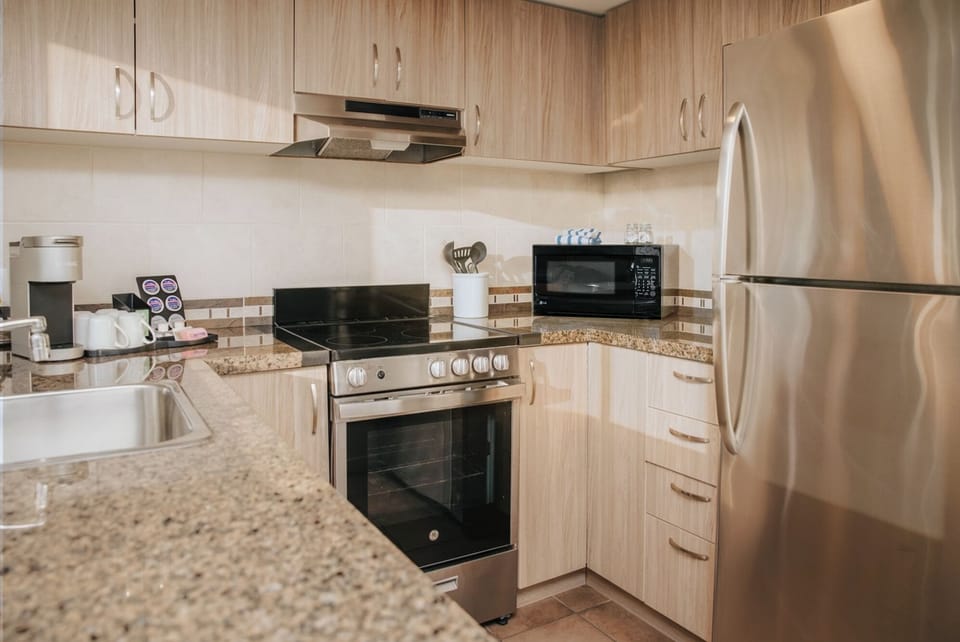 Coffee/tea maker, fridge, microwave, oven